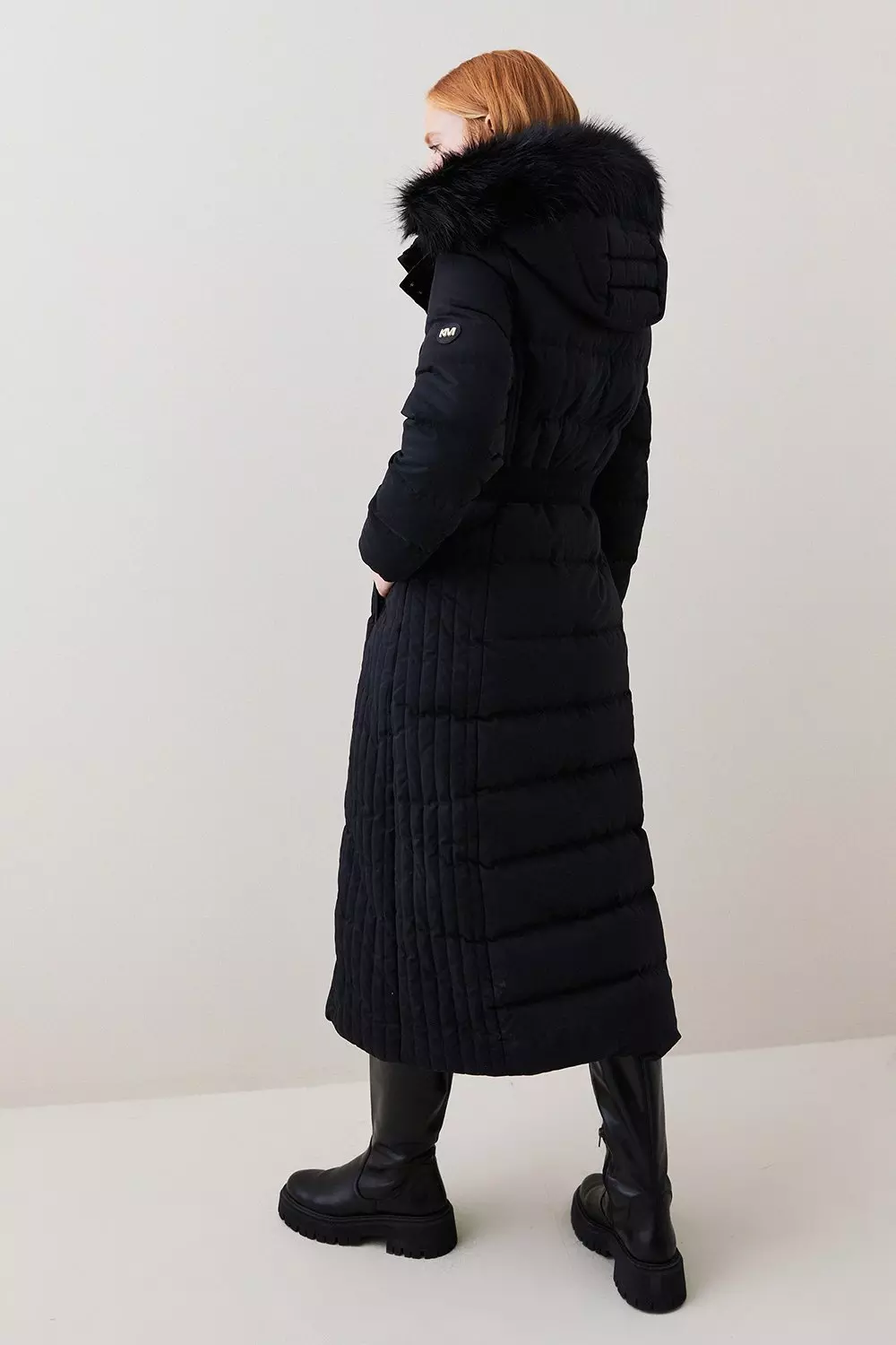 Knee length puffer coat with fur trimmed hood online