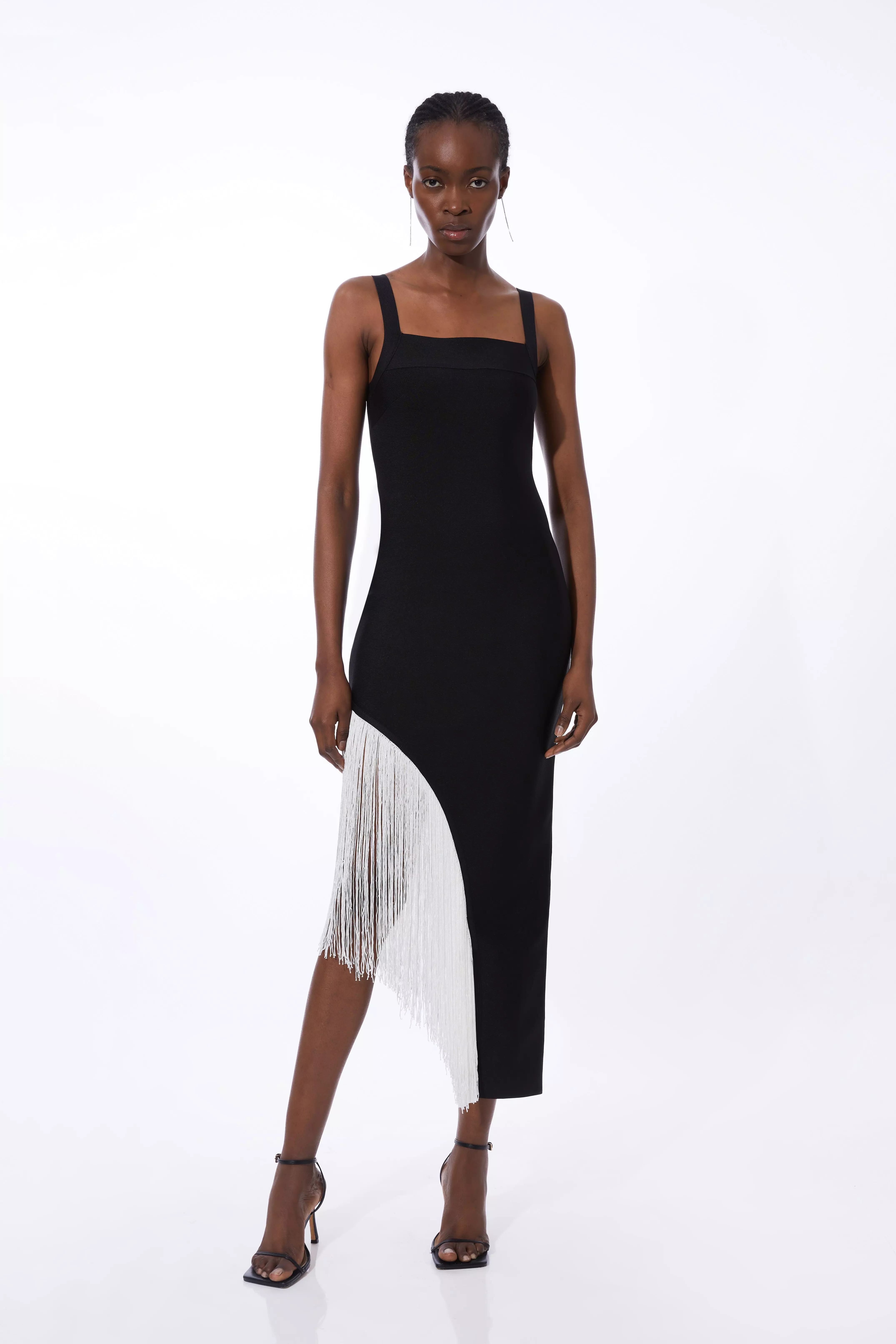 Black dress with fringe hem hotsell