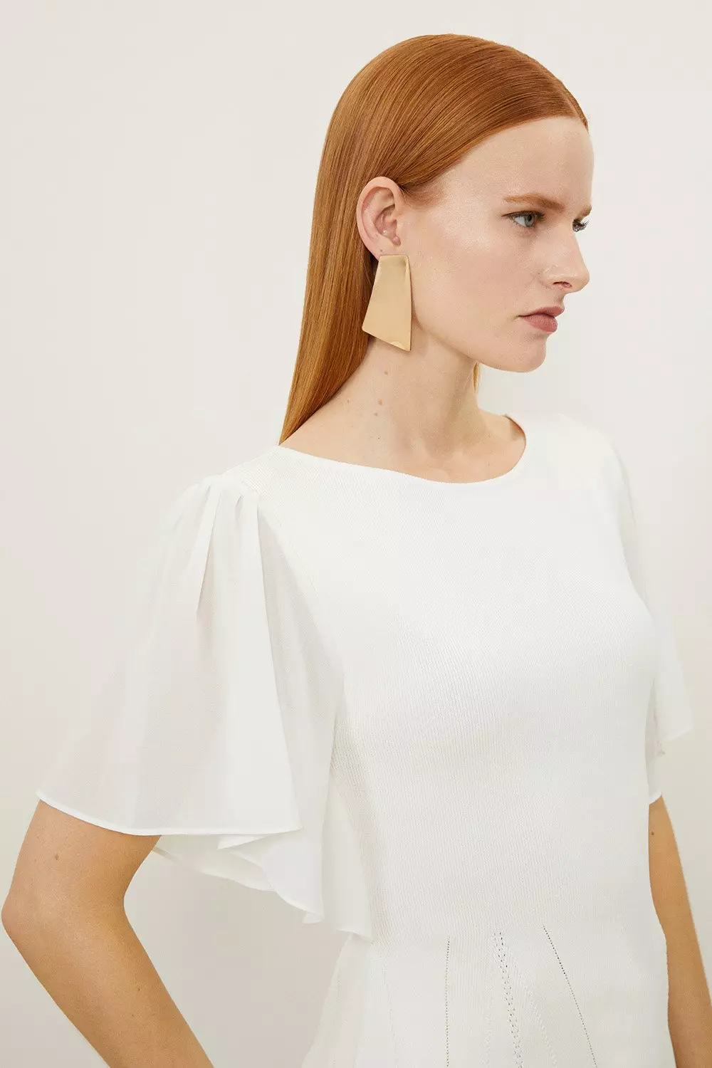 Viscose Blend Knit Chiffon Angel Sleeve Peplum Top | Karen