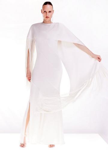 Ooto Viscose Crepe And Satin Panelled Fringed Woven Maxi Dress With Detachable Cape ivory