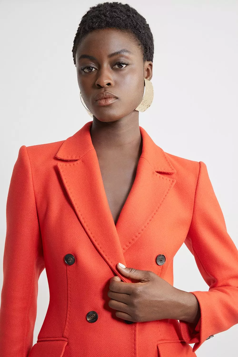Coat with red patch deals
