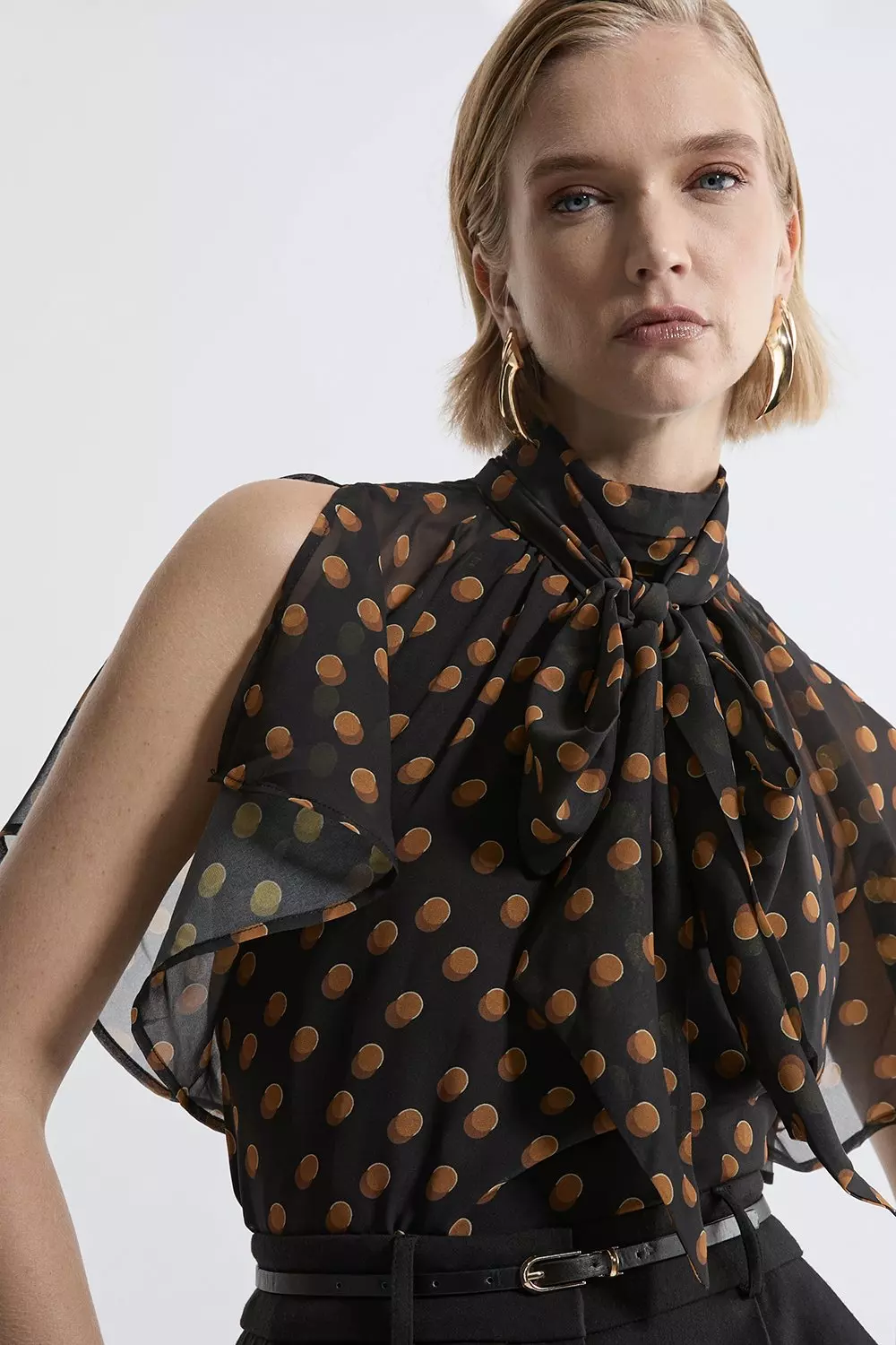 Polka dot blouse with bow hotsell