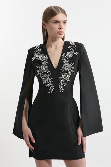 Black Bandage Form Fitting Cape Sleeve Embellished Mini Dress