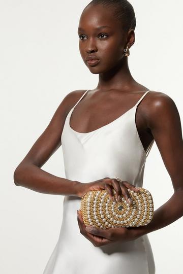 Golden Oval Pearl Detailed Embellished Clutch Bag gold